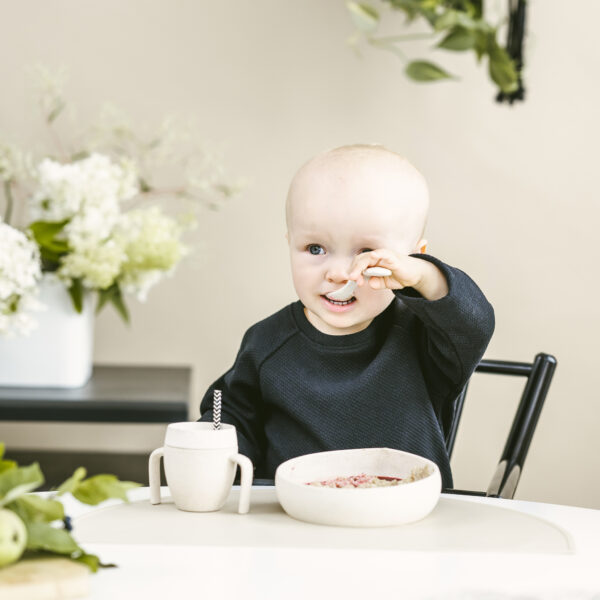 a infant eating himself